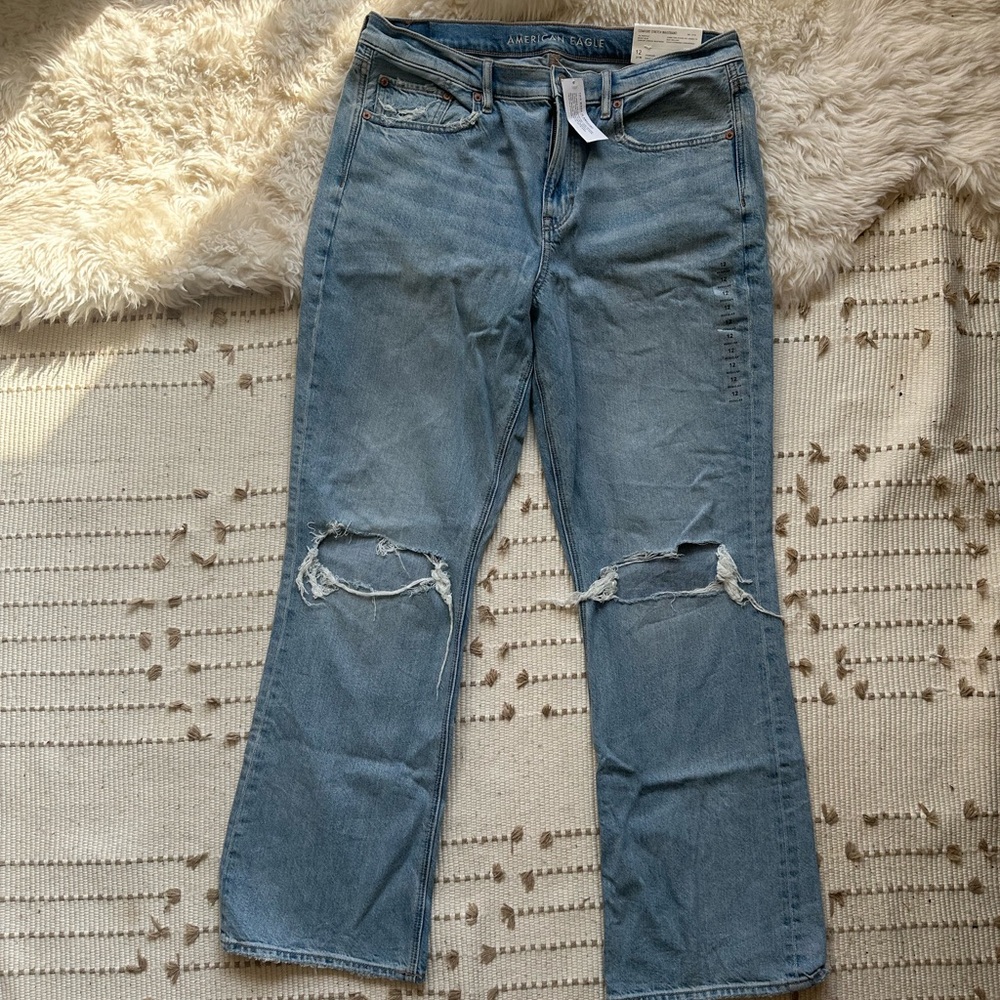 NWT American eagle 90’s bootcut high rise distressed light wash size 12
